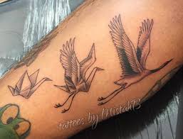 Tattoos of the paper crane have been growing popular, not only for the symbolism, but because it is a really cool concept of being able to take a simple piece of paper and turning it into. 19 Stunning Crane Tattoos And Their Meanings Nexttattoos
