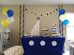 Combine this idea of rubber ducks floating on the surface of the water with an idea for an ornament! Nautical Baby Shower Blue And Yellow Sailor Theme Elephant Baby Shower Theme Boy Baby Shower Themes Baby Boy Shower