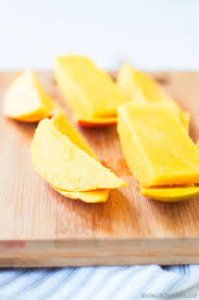 You want to turn it so a narrow side faces up. How To Cut A Mango The Best Method With Easiest Step By Step Photos