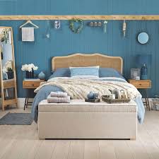 Go prowling around the little antique shops and thrift stores for blue items, striped patterns and little seaside finds. Coastal Themed Bedroom Harmonious Nautical Interior Design Ideas