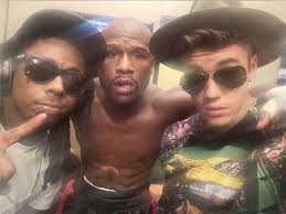 The Source |Lil Wayne Performs New Song "Believe Me" As Justin Bieber &  Circus Act Escort Floyd Mayweather Into Ring