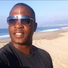 WATCH: This beloved teacher and coach was deployed in Afghanistan. When he  surprised his students with his homecoming, a group of teenage boys piled 