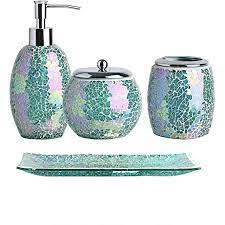This elegantly designed bathroom set includes an unusual and quite beautiful square soap dish, a liquid soap/lotion dispenser, a toothbrush holder, tissue box cover, a clear glass tumbler in a patterned stand and a wastebasket. Amazon Com Whole Housewares Bathroom Accessories Set 4 Piece Glass Mosaic Bath Accessory Completes With Lotion Dispenser Soap Pump Cotton Jar Vanity Tray Toothbrush Holder Turquoise Home Kitchen