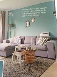 groene muur grijze bank en combi met taupe groene muur grijze bank thuisdecoratie