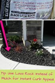 A Great Tip Use Black Lava Rock In Front Yard For Easy Instant Curb Appeal In In 2020 Rock Flower Beds Front House Landscaping Landscape Ideas Front Yard Curb Appeal