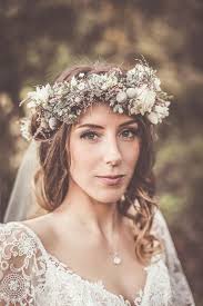 Bohemian Bride With Lace Dress And Flower Crown Winter Wedding Hair Wedding Hairstyles With Veil Winter Barn Weddings