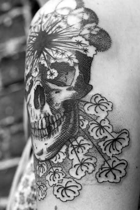 upclose of illustrative skull with moon phases and ladies lace flower stipple shaded blackwork tattoo by Canyon Webb
