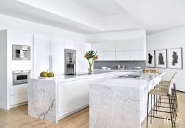 modern white kitchen with two islands