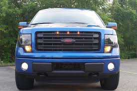 Has anyone come across anything like this that will fit a 2015? 2013 2014 Ford F150 Raptor Style Grille Light Kit Clear Lens Amber Led