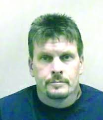 Howell Spits On Prosecutor