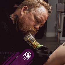 Who is a good coverup tattoo specialist in the area?