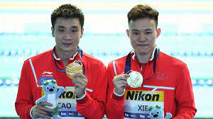Xie siyi was born on 28 march 1996 in shantou, guangdong, china. Cao Yuan Xie Siyi Win Men S Synchronized 3m Springboard Gold For China Cgtn