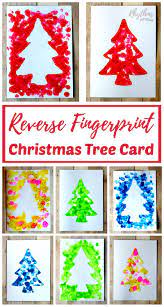 Kids color and cut the pieces, then glue the card together. Reverse Fingerprint Christmas Tree Cards Christmas Tree Cards Diy Christmas Cards Christmas Cards Kids