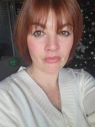 What haircut suggestions are there for a Cocker Spaniel with an upside down  V shape fringe?