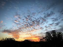Sunrise Kisses The Early Morning Sun Kisses The Clouds Awake On A New Mexico Dawn Sunrise New Mexico Clouds