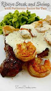 Ribeye Steak And Shrimp With Parmesan Sauce For Two Tender Juicy Grilled Ribeye Steak Is Topped With Seasoned Steak And Shrimp Recipes Parmesan Sauce Recipe
