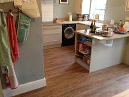 For enhanced practicality, luxury vinyl tiles are designed with easy installation in mind. New Luxury Vinyl Tiles Kitchen And Dining Room Floor Stockport Cheadle Floors Floor Layer Manchester