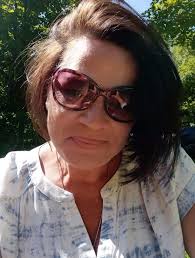 US citizen adopted by Canadians seeking status card