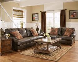 Rustic Paint Colors Truffle Color Rustic Living Room With Nailhead Deatils By Ash Brown Couch Living Room Brown Furniture Living Room Brown Living Room Decor