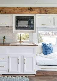 Tour This Remodeled Rv Filled With Lots Of White Shiplap And Warm Wood Tones From Wilsongrandadventures Rv Kitchen Remodel Kitchen Remodel Interior Remodel