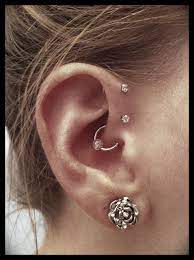 Double Forward Helix I Might Have To Do Double Instead Of Triple Because I Have Small Ears Evil Eye Jewelry Eye Jewelry Ear Piercings