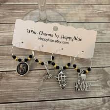 Vegas sports shop has a specialized assortment of team gear from your favorite las vegas sports teams. Hockey Wine Charm Vegas Golden Knights Golden Knights Wine Etsy Wine Charms Wine Glass Charms Vegas Golden Knights