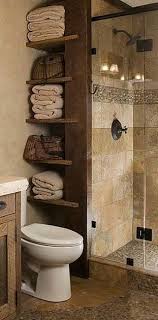 Towel Storage Beside Shower Stall This Tiny Bathroom Storage Shower Stall Small Bathroom