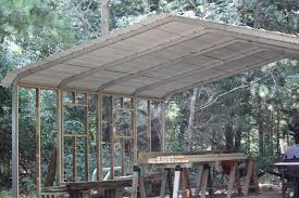 Before we dive into all of the internet's best carport designs and inspirations, let's discuss why you would choose to go with a carport over a garage? The Cabin Countess Making A Sows Ear Metal Carport Into A Silk Purse Log Garage