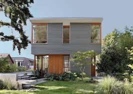 Modern exterior with solar panels. Exterior Siding Idea Use Corrugated Metal Siding To Add Texture To A House