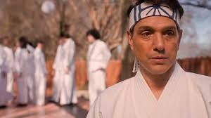 Johnny's behavior towards Mr. Miyagi in Cobra Kai
