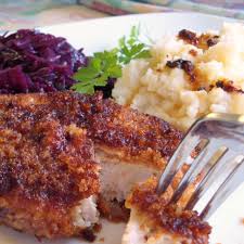 Place bread crumbs on a plate. German Schnitzel Recipe Oma S Jagerschnitzel