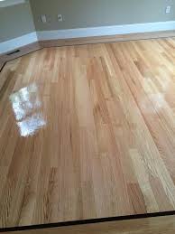 We Installed A Beautiful 3 1 4 Red Oak With 1 Walnut Strip Custom Hardwood Flooring For This Beautiful Home After Hardwood Floors Flooring Projects Red Oak