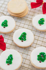 Christmas cookies christmas cookies are traditionally sugar biscuits and cookies (though other flavors may be used based on family traditions and individual preferences) cut into various shapes related to a photograph. Christmas Tree Sugar Cookies With Fondant