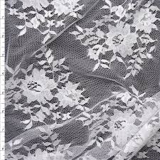 Double bordered, perfect for wedding dresses and trains. Cali Fabrics White Chantilly Lace Fabric By The Yard