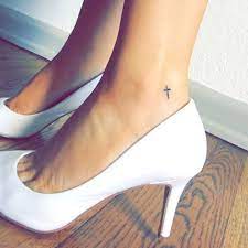 Has a shooting star, flower and small cross on her right ankle and foot. 65 Best Ankle Tattoos For Women 2021 Guide