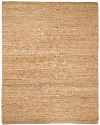 A temporary rod which establishes the length of pile is put in front of the warp, these are being changed. Anji Mountain Portland Natural Jute Rug Studio