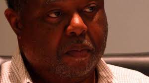 Prohibited from serving