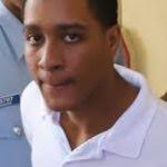 Mother, son answer to charge of wounding businesswoman