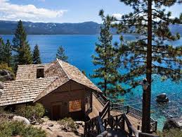 The cabin has a spacious fenced backyard and charming interior. Howard Hughes Lake Tahoe Estate 19 5m Business Insider Lake Tahoe Cabin Tahoe Cabin Lake Tahoe Getaway