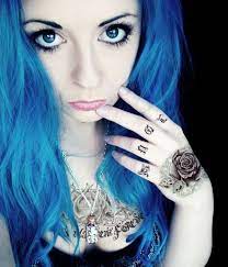 Contact your company to license this image. Bibi Barbaric Neon Blue Tats Beauty Tattoos Scene Hair Eye Make Up