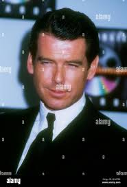 PIERCE BROSNAN in REMINGTON STEELE (1982), directed by DON WEIS and SEYMOUR  ROBBIE. Credit: MTM ENTERPRISES