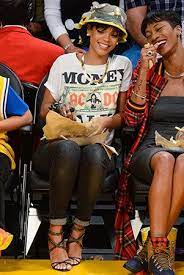 Rihanna S Bucket Hat Is Sporty Chic And Totally 90s Here S How To Cop Her Look Rihanna Style Rihanna Fashion