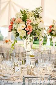 20 Truly Amazing Tall Wedding Centerpiece Ideas Tall Wedding Centerpieces On A Bu Tall Wedding Centerpieces Greenery Wedding Centerpieces Wedding Centerpieces