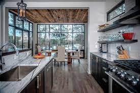 Hickory floors matched with hickory cabinets are too busy in the kitchen because of all the colors and grains in the hickory wood. Hickory Floors Design Ideas