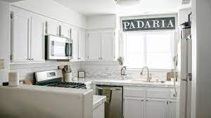 We were surprised by how thin one coat of the white dried. How To Paint Honey Oak Kitchen Cabinets Collectively Casey