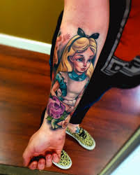 Home 35 entertaining cartoon tattoo ideas alice in wonderland leg tattoo. Alice In Wonderland Inspired Tattoos Tattoo Ideas Artists And Models