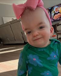 18 months old today! She's hilarious, brilliant, determined, tender hearted  and so kind. Fave foods: chicken nuggets, Mac n cheese, cornbread Fave  things to say: Awwwwww (when she pats her lovey or