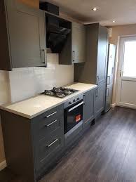 White shaker kitchen with wooden dark grey kitchen with vintage oak worktops. Kitchen Worktop Replacement In Nottingham Alh Interiors Trustatrader