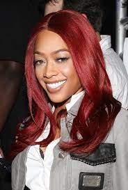 He has short, dark, curly hair and a small beard. Black Celebs With Red Hair Essence