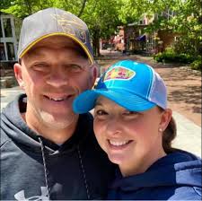 Can garment bag be hooked to suitcase at check in?